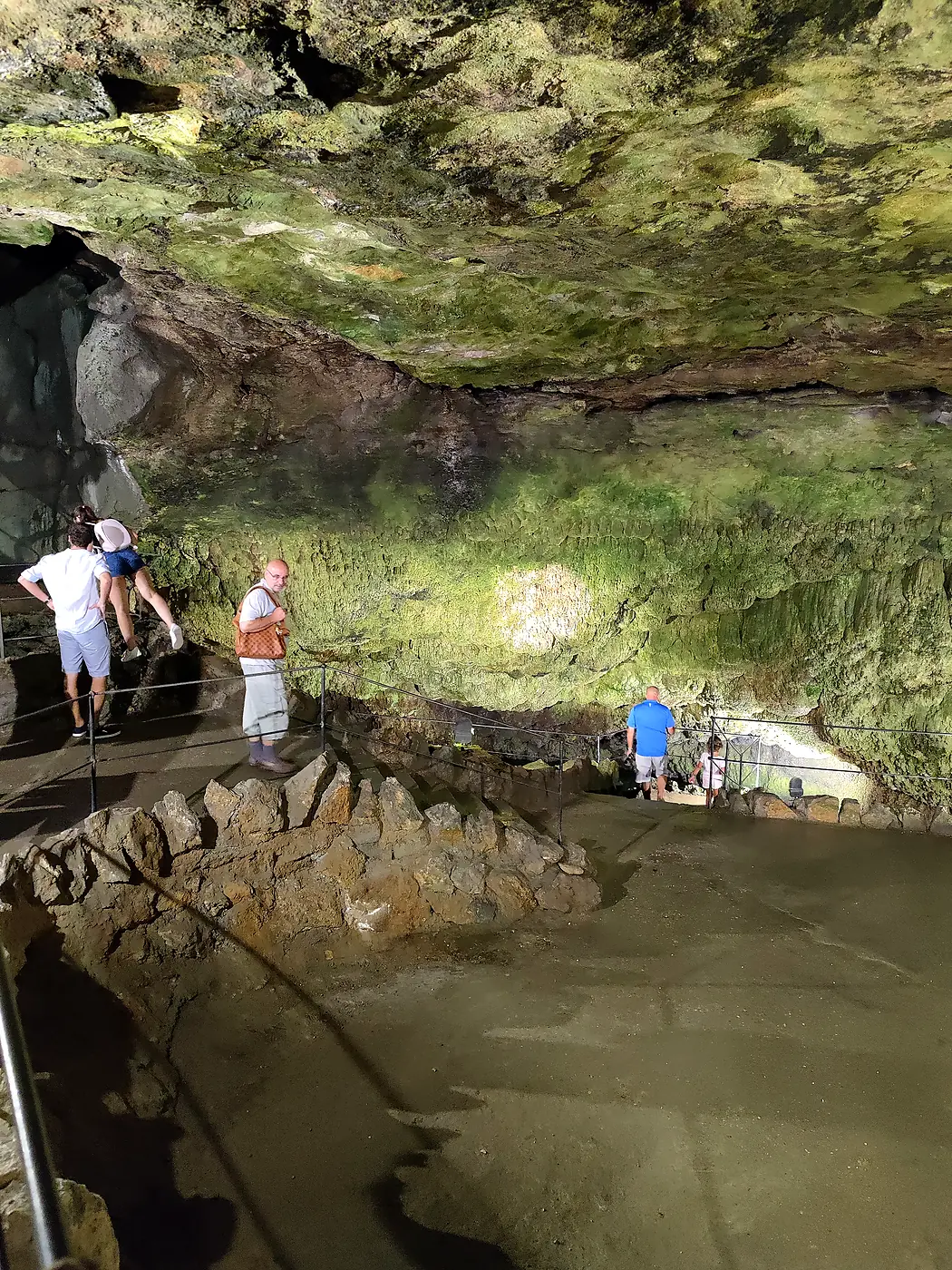 The travertine cave beneath Bojnice Castle with a visitor walkway
